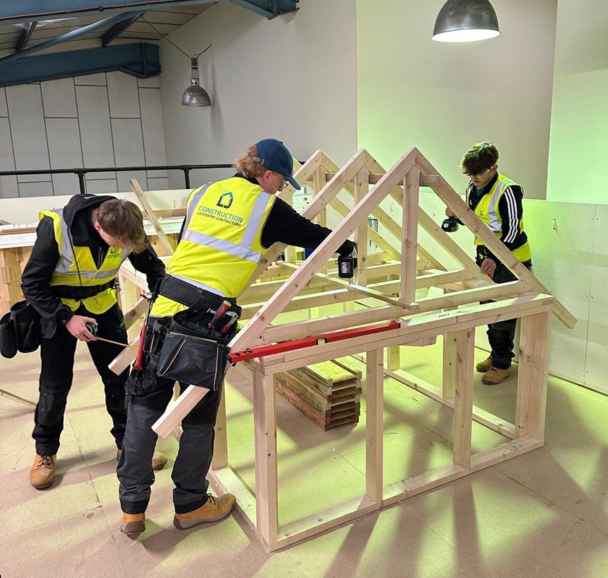 3 LJ Construction apprentices training at the carpentry academy