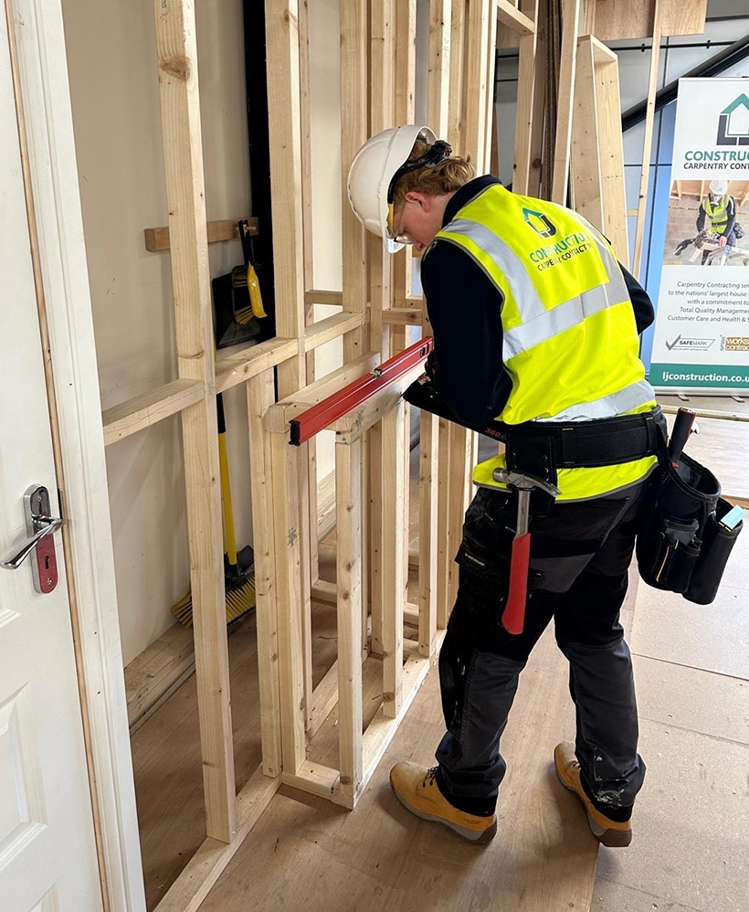 An LJ Construction apprentice training at the carpentry academy