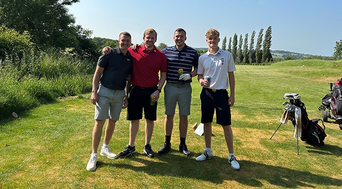 Golfers enjoying the sunshine on a golf course