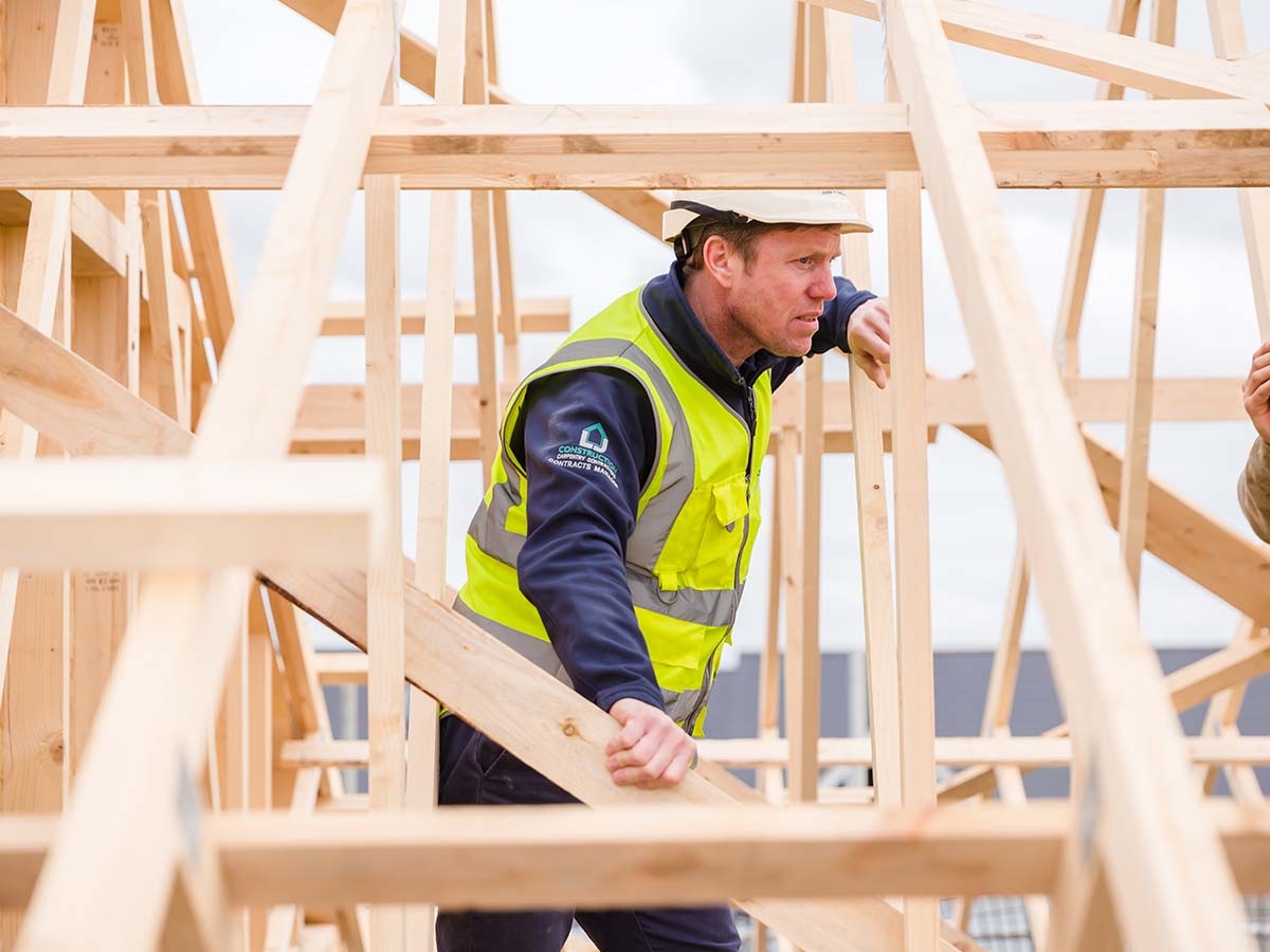 Contracts manager checks health and safety compliance on site