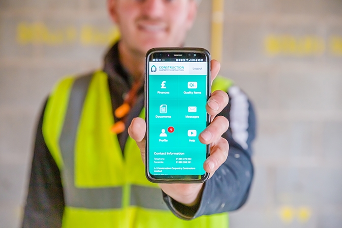 Close-up view of LJ Construction customer relationship management software on a smartphone. 